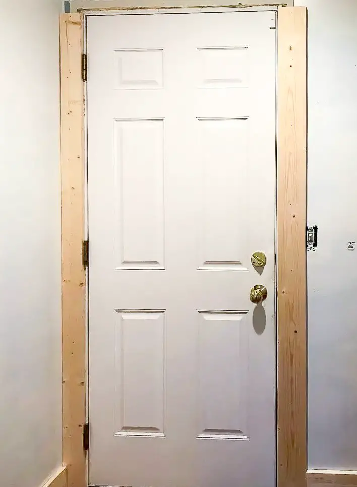 Craftsman trim around an exterior door.