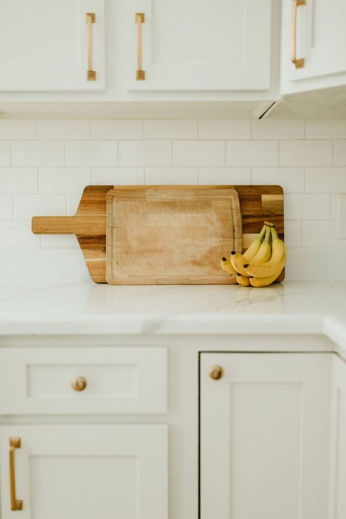 Countertop with cutting board and bananas
