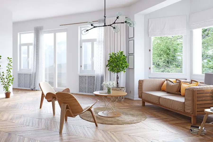 Open plan living room with a sofa and chair.