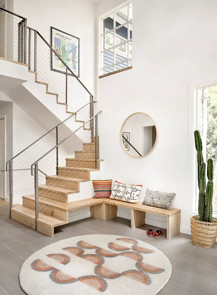 Open turning staircase with a landing for hardwood stairs vs carpet post