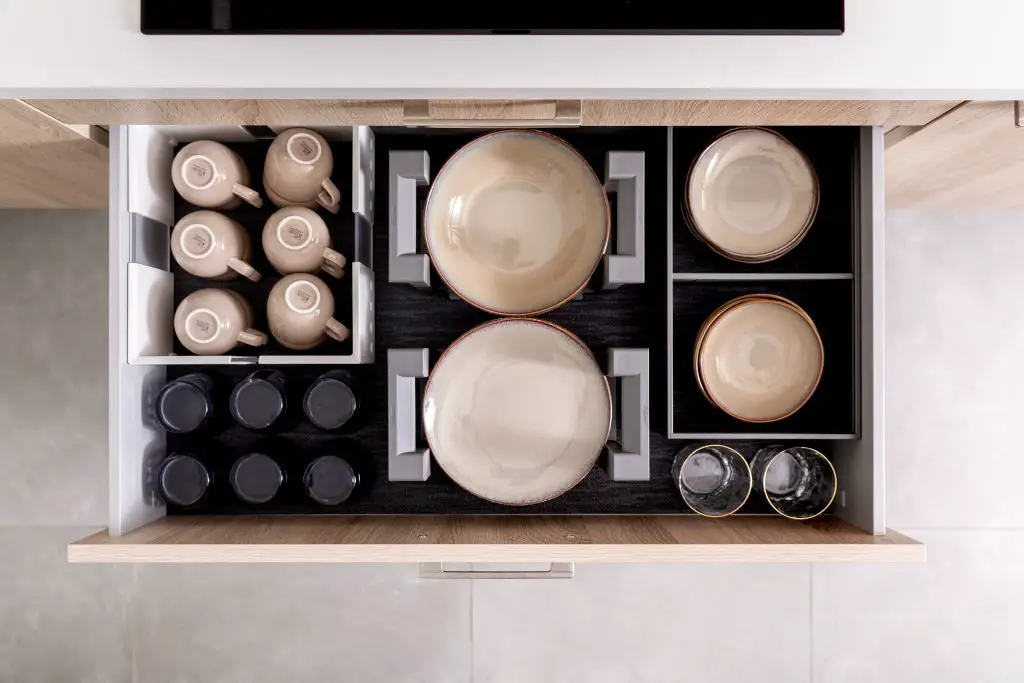 Organized kitchen drawer for effectively organizing your home.