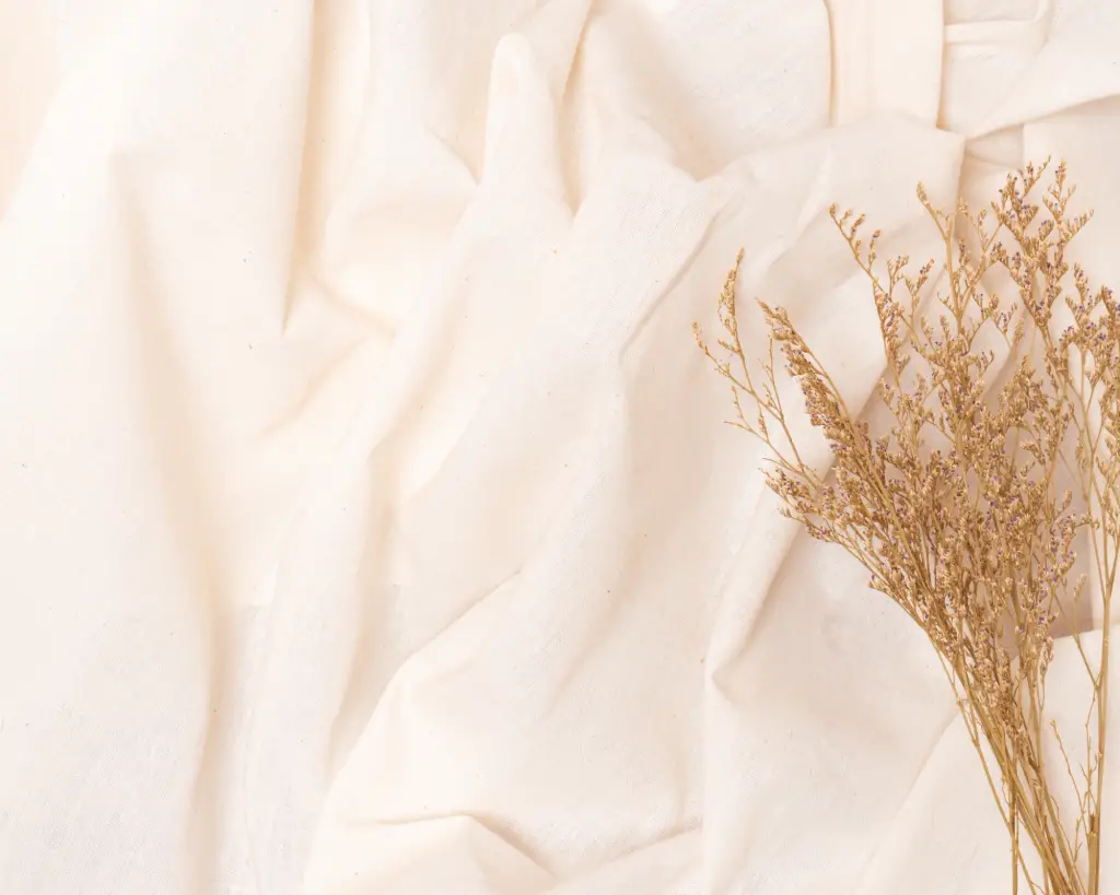 White sheet with wheat on it.