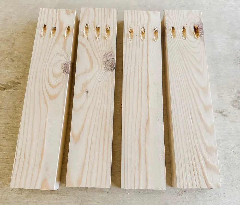 Four 2x6 pinewood boards with pocket holes drilled.