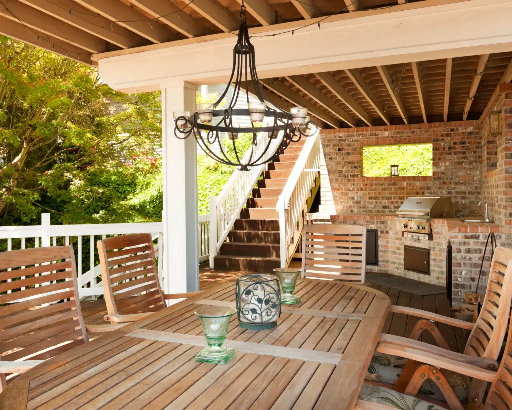 outdoor deck with stairs leading down to it.