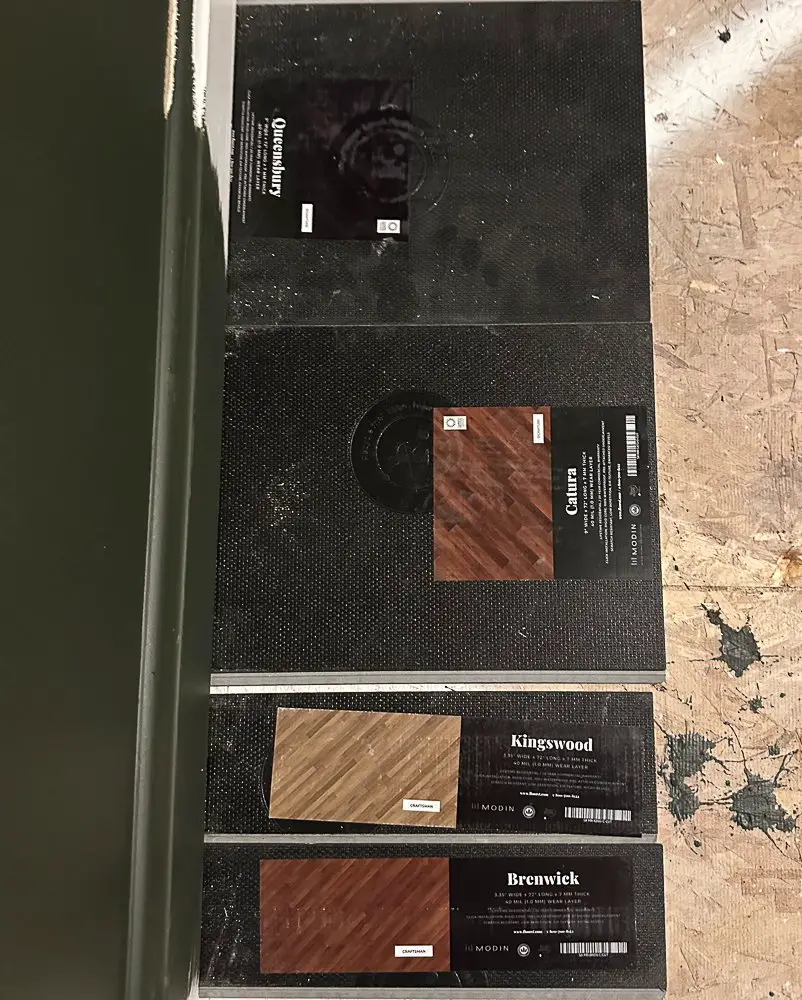 Back side of floor samples next to millwork wall.