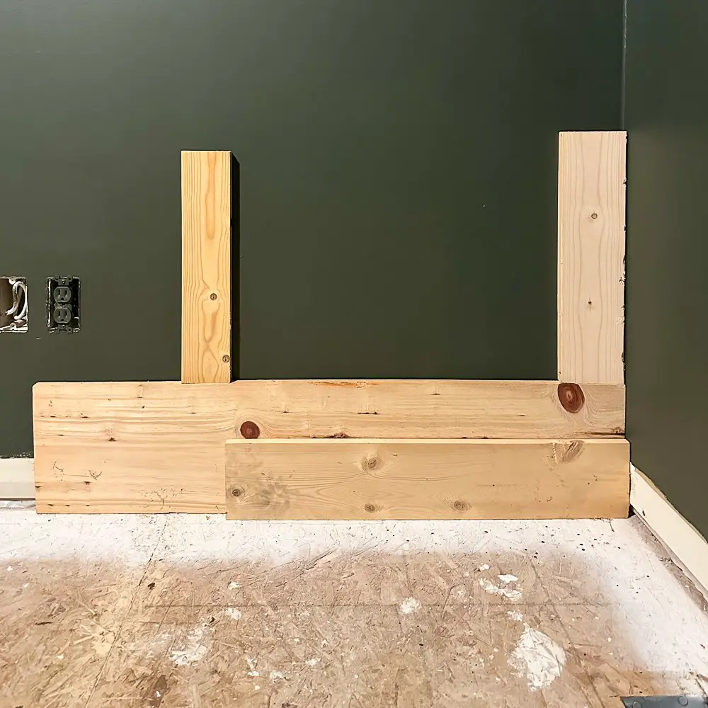 Scrap trim on a wall for home office guest room reveal post.