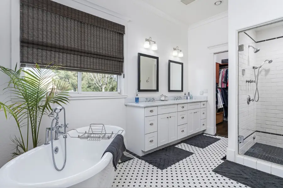 Bathroom with tile flooring.