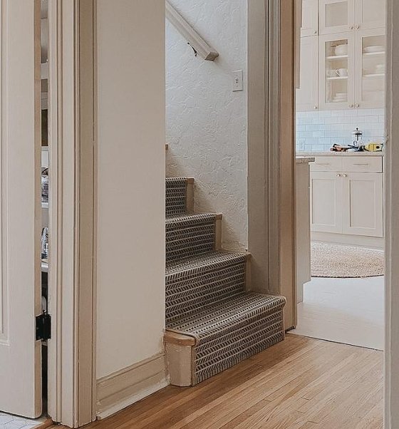 Taupe color stairs with taupe color interior trim.
