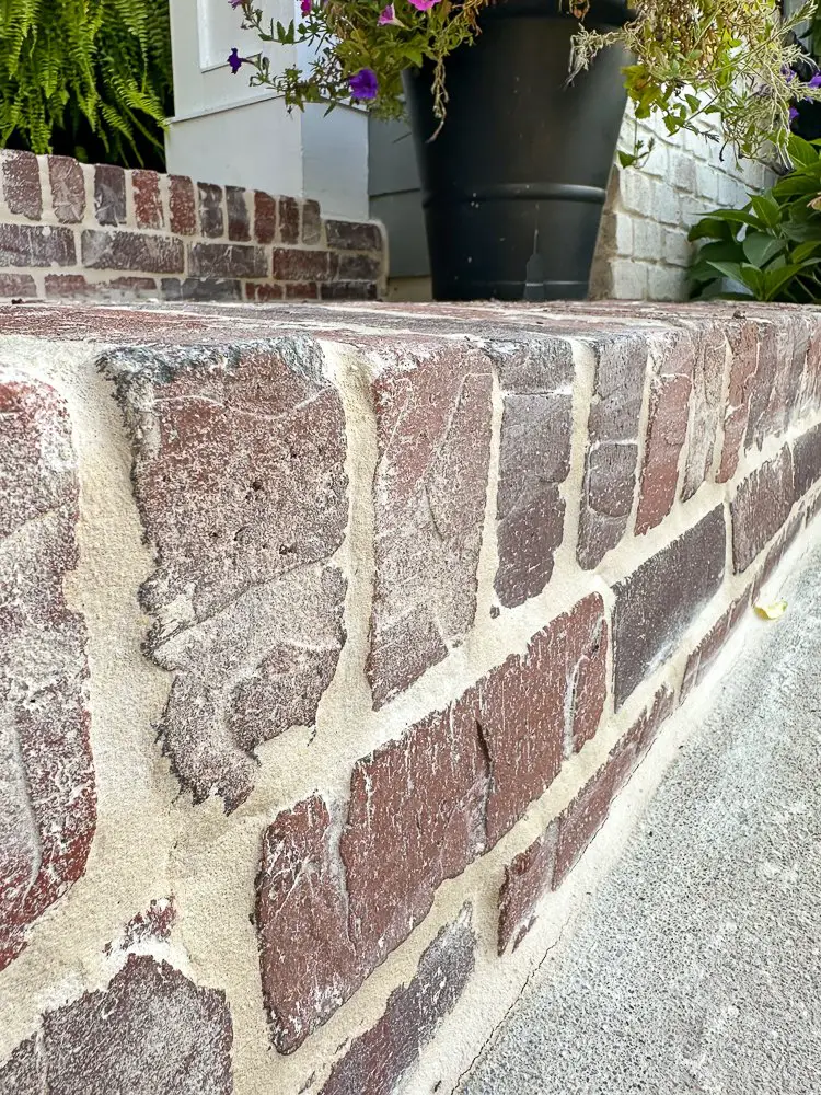 Side view of brick pavers on front porch.