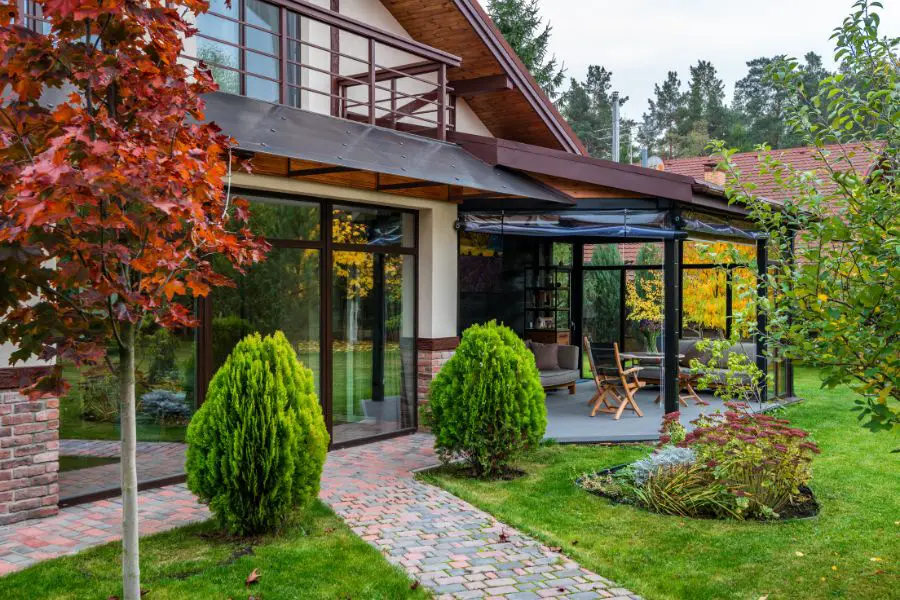 Back of house with porch and walkway.