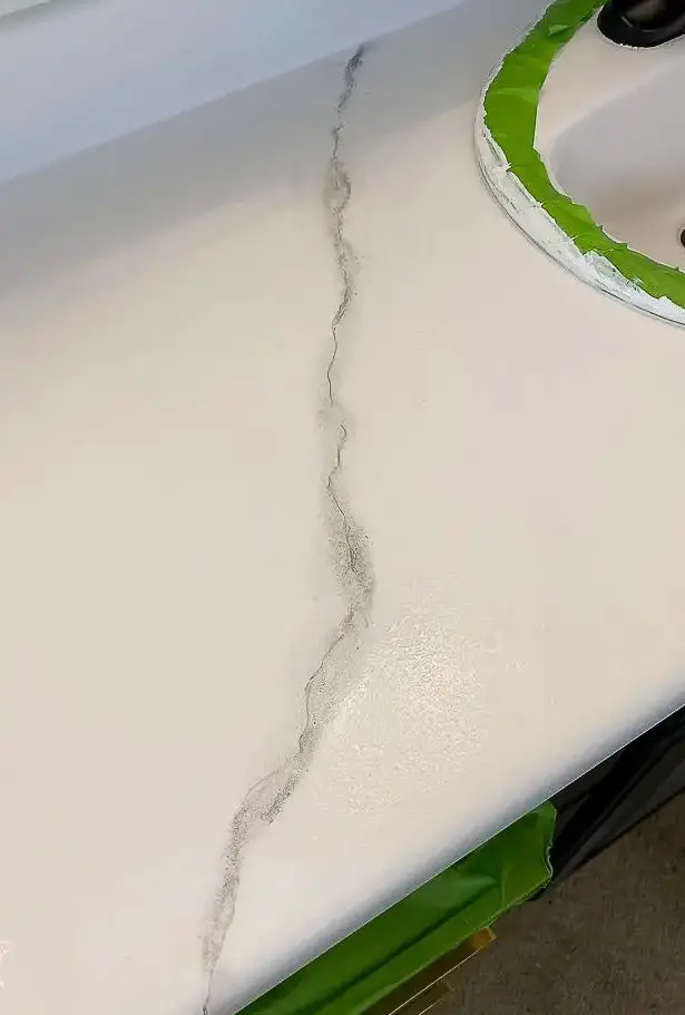 Extended grayish black marble vein.