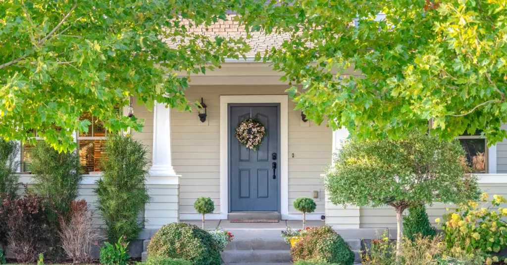A front door with a wreath.