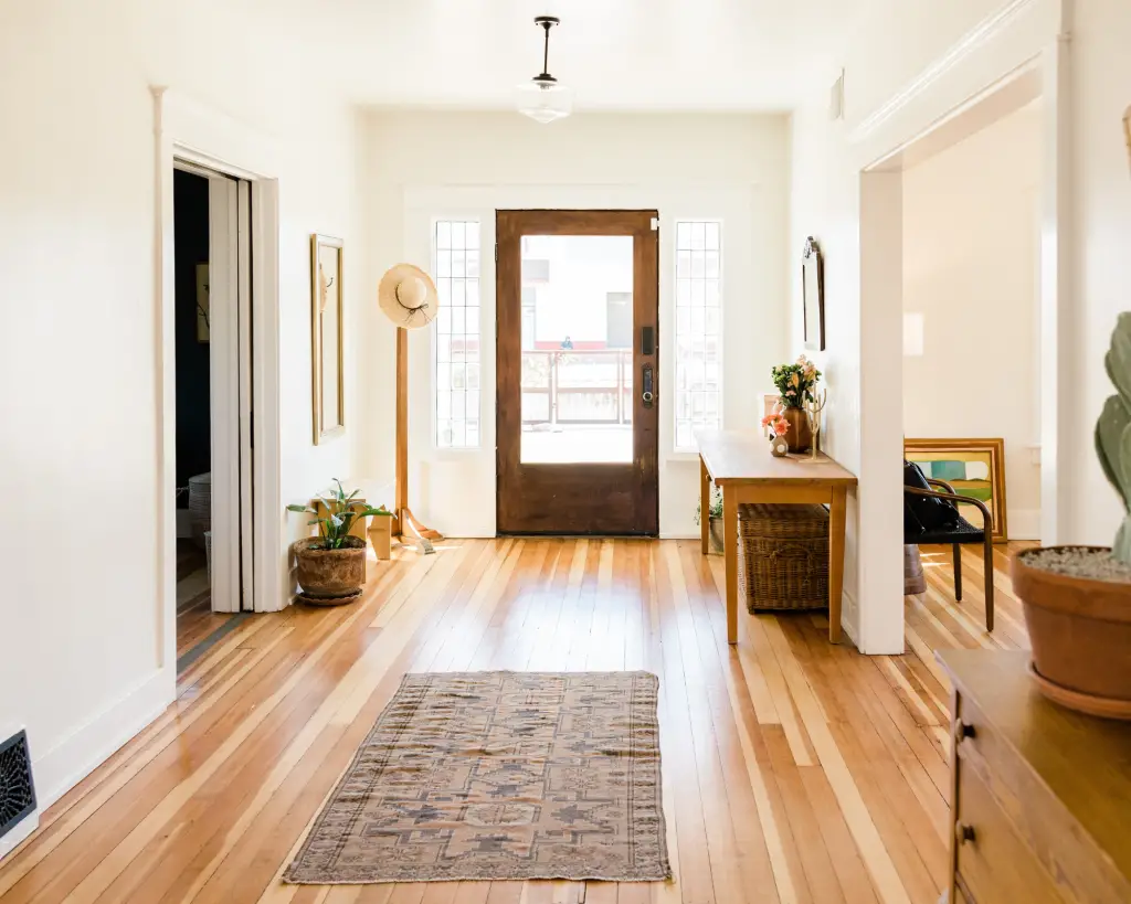Entryway. Open and spacious. With long runner rug.